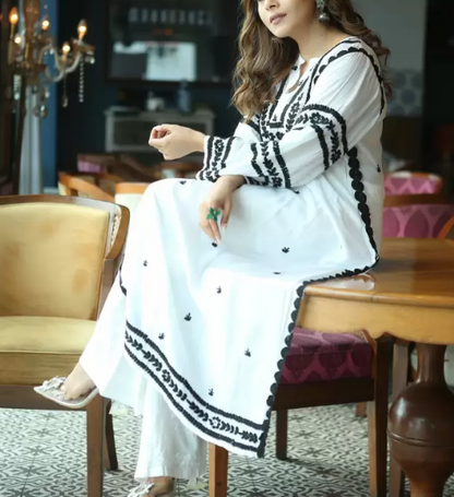 Women Embroidered Cotton Blend Straight Kurta