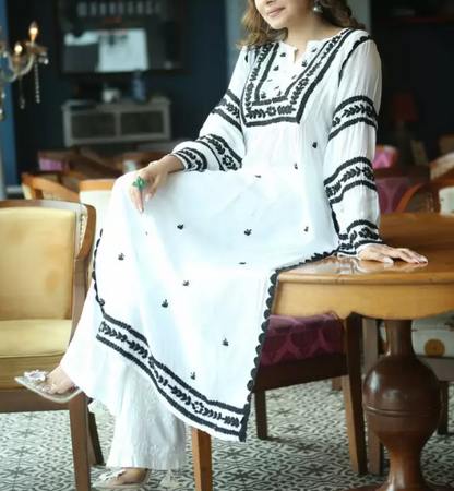 Women Embroidered Cotton Blend Straight Kurta